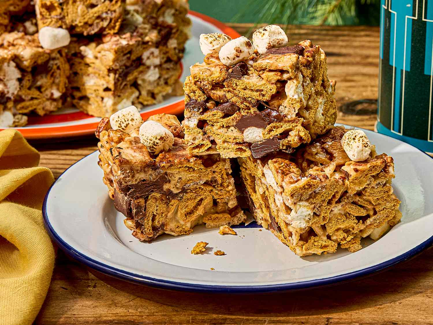 Stacked smores rice krispie treats on a plate