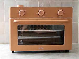 The Our Place Large Wonder Oven on a gray kitchen counter