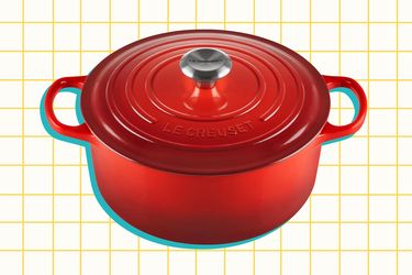 Le Creuset Enameled Cast Iron Signature Round Dutch Oven on a yellow grid background
