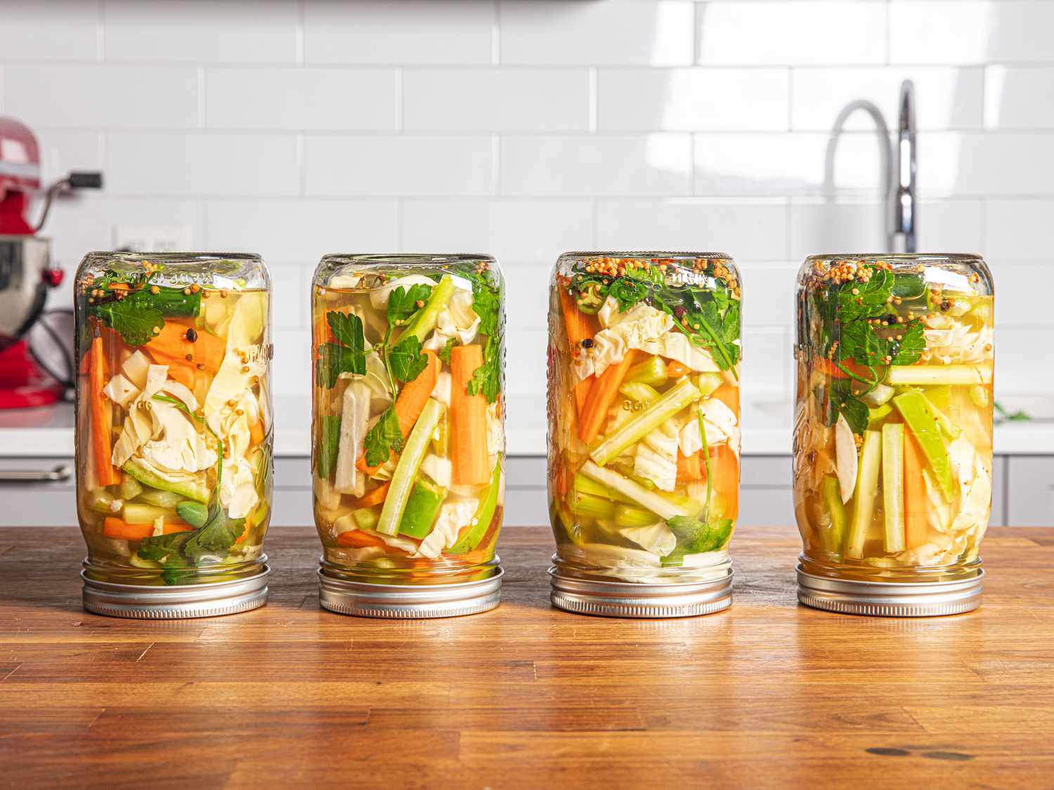 Four jars flipped upside down