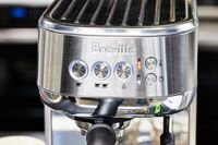 Closeup of Breville Bambino Plus Espresso Machine control panel buttons