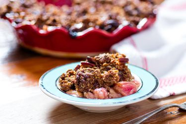 Rhubarb crisp, served in a small bowl.