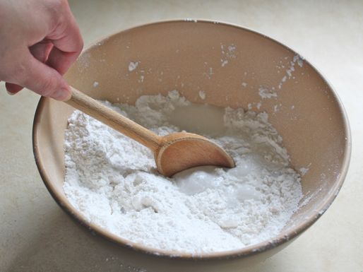 Flour is added to the mixing bowl.
