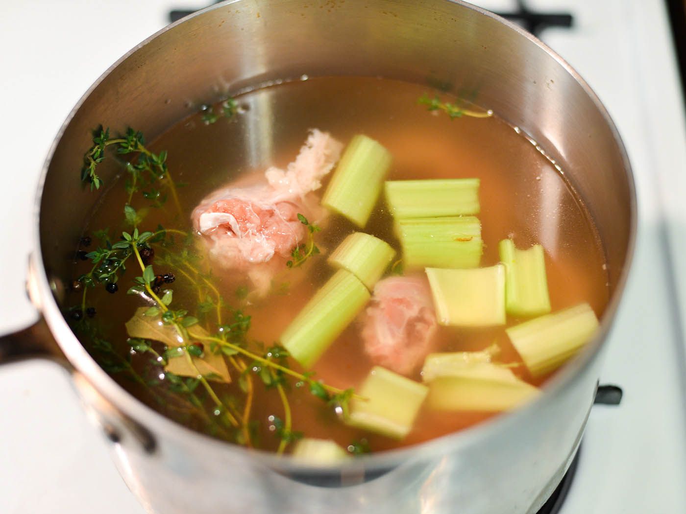 Making stock with the turkey backbone.