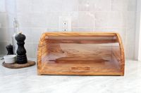 The Williams Sonoma bread box on a marble kitchen coutnertop.