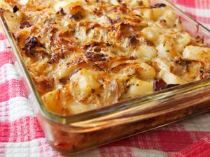 Polish cabbage, potato, and bacon casserole baked to a golden brown