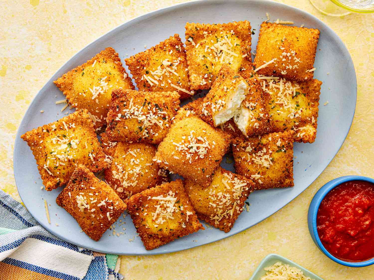 Overhead view of toasted ravioli on a plate