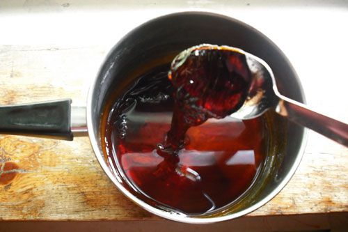 A small saucepan of dark, sticky Vietnamese caramel 