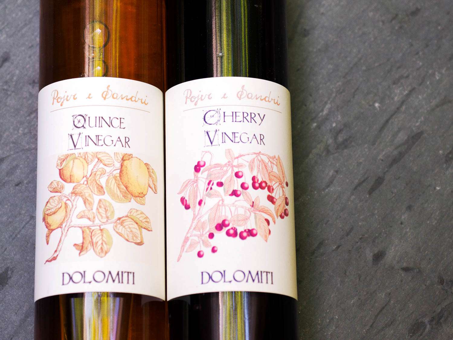 Two bottles of fruit vinegar.