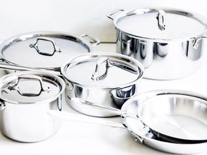 All-Clad D3 3-Ply Stainless Steel Cookware Set 10 Piece on a white surface