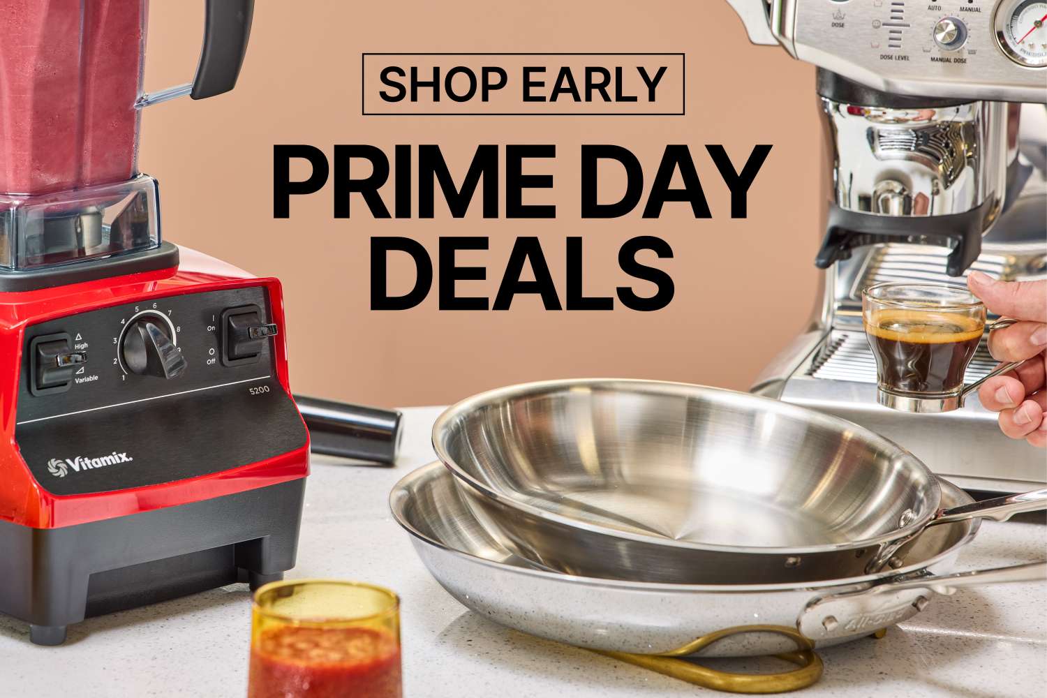 Kitchen appliances and utensils on a counter, including a blender and a coffee machine