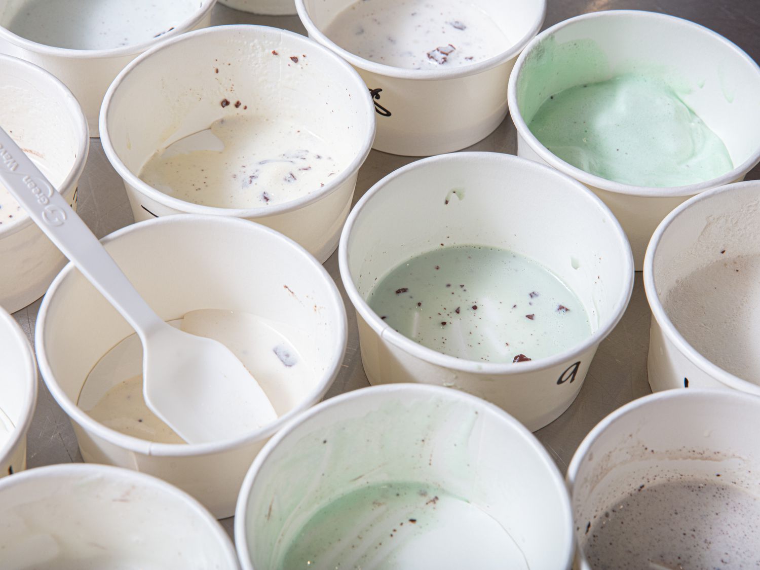 Empty bowls of mint chip ice cream.