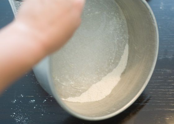 let flour coat sides of the cake pan
