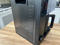 A closeup of the water reservoir of the Fellow Aiden coffee maker.