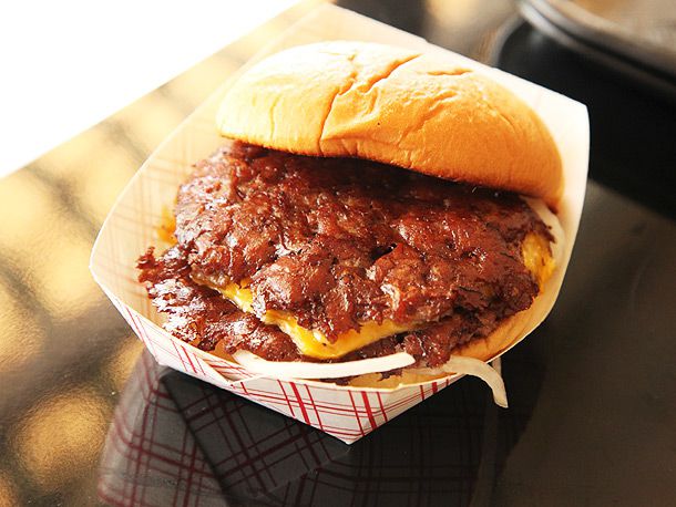 Harlem Shake's double patty smash cheeseburger in takeout boat