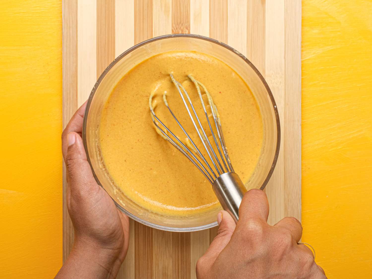 Overhead view of whisking batter