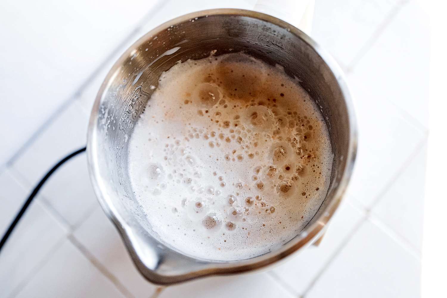 a carafe of pulverized almonds and water in the alfabot