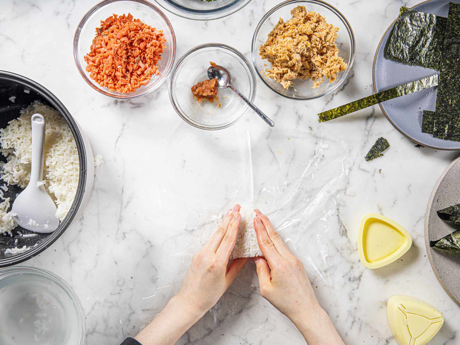 Shaping Onigiri with hands