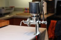 the masienda masa mill assembled on a countertop