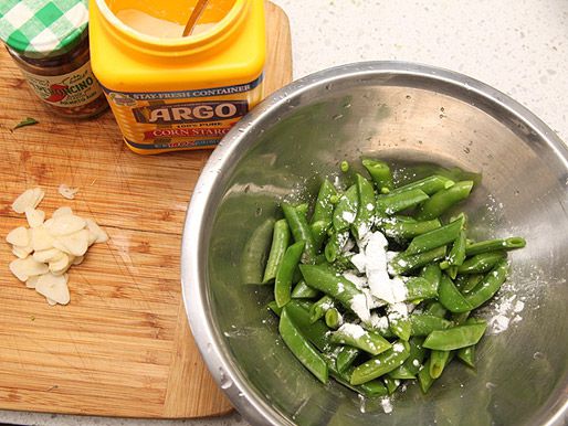 The snap peas are tossed with cornstarch.