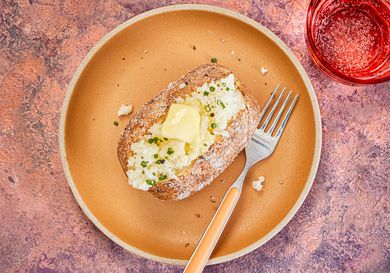 Overhead view of air fryer baked potato