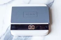 Acaia Lunar Scale with a weight display of 0.0, brand name Acaia visible on top