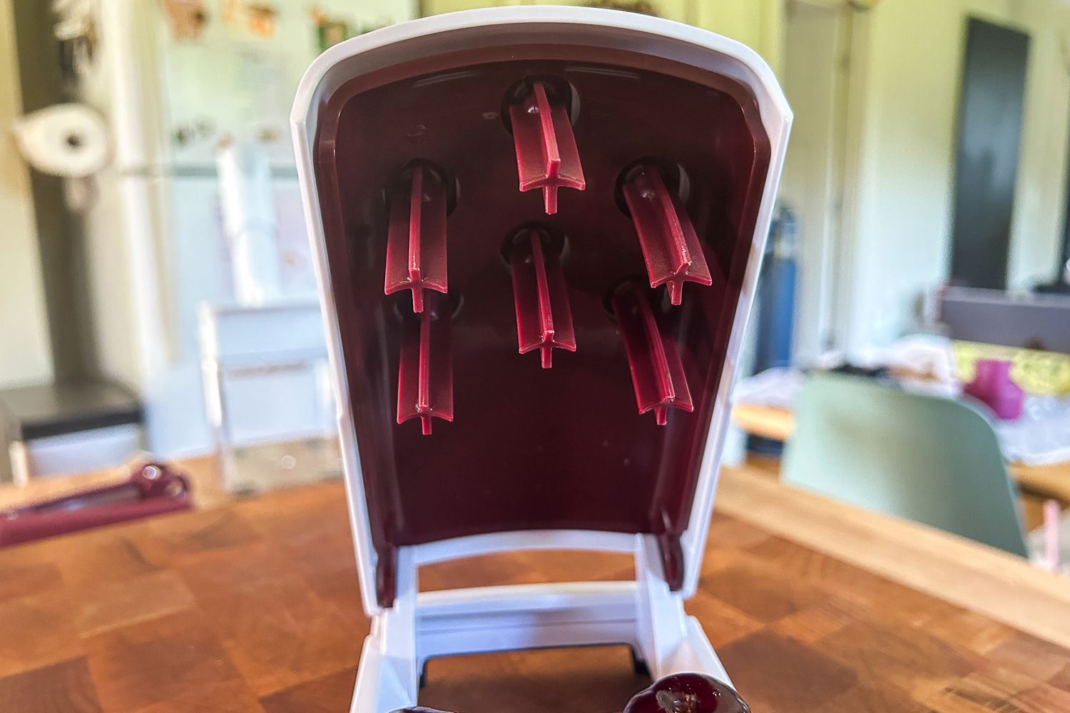 A closeup of the plungers of the OXO Good Grips Multi Cherry Pitter