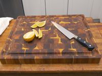 the Yes4All wooden cutting board with sliced lemons