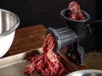 grinding beef chuck in the chop-rite meat grinder