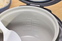 The measurements on the side of the Zojirushi NS-RPC10HM Rice Cooker bowl