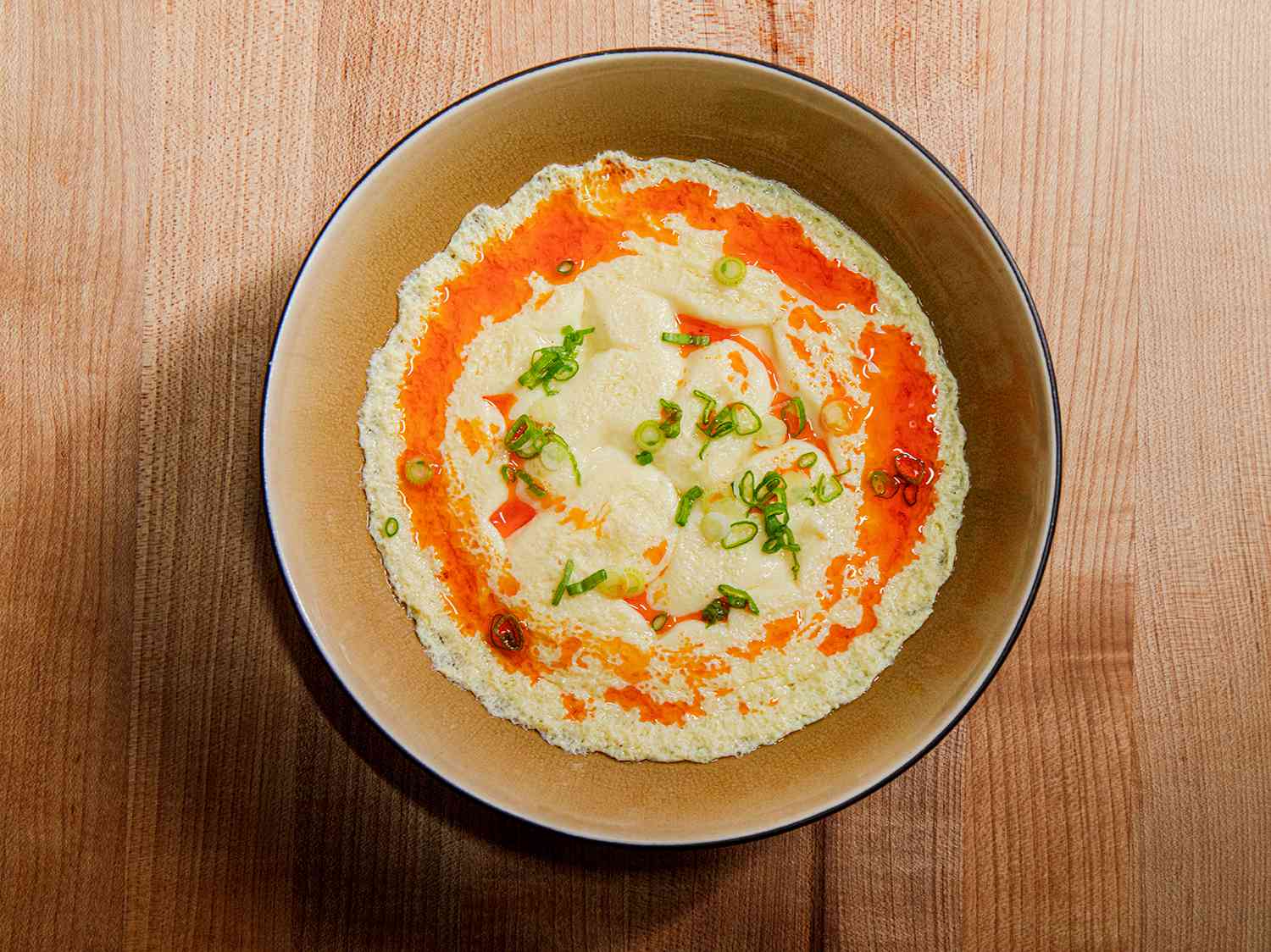 An overhead view of a dish of steamed eggs