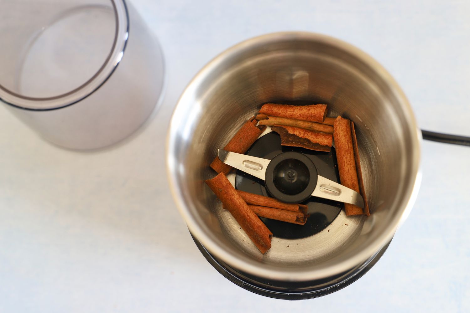 Cuisinart Spice and Nut Grinder with cinnamon sticks inside