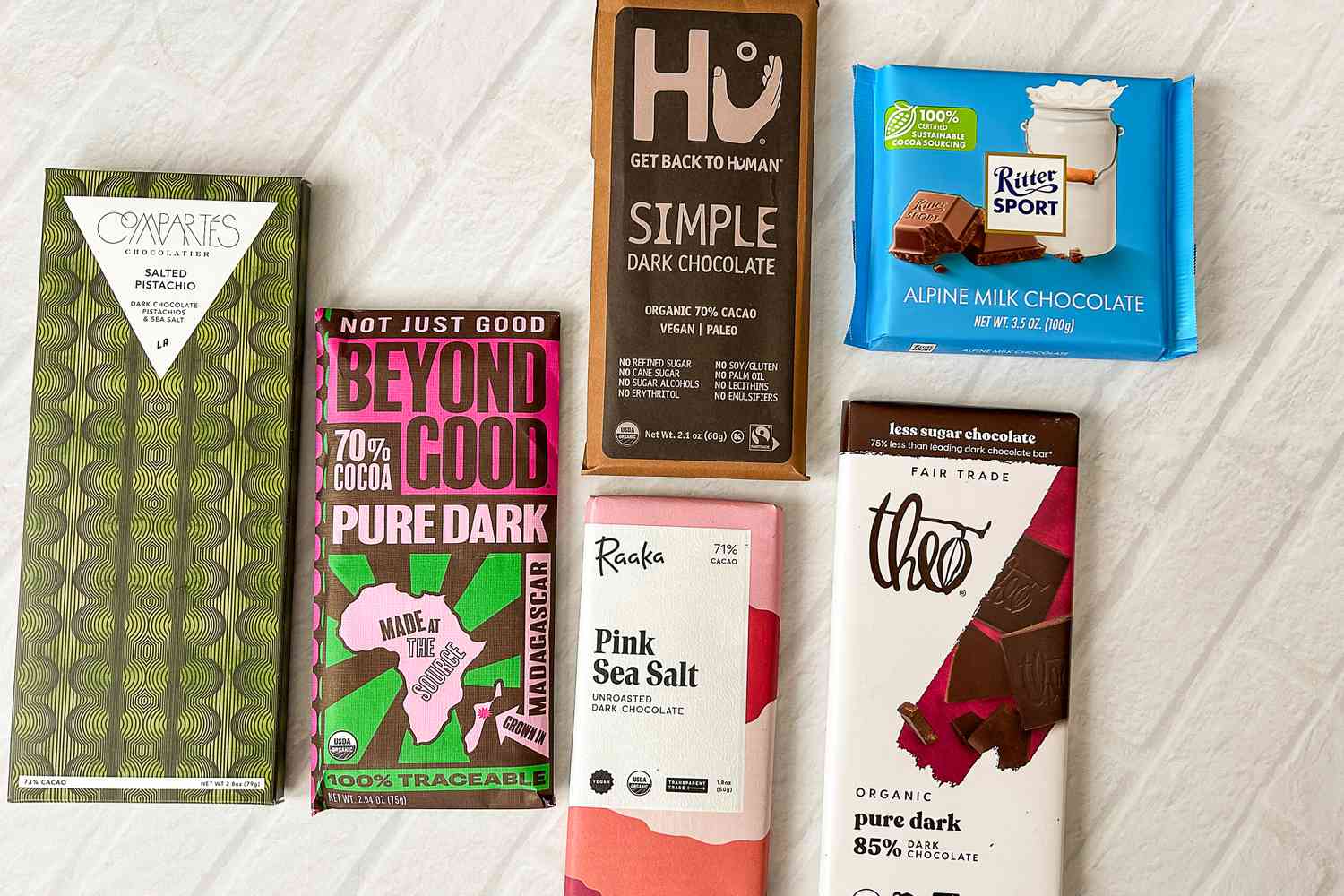 A collection of wrapped chocolate bars on a white background