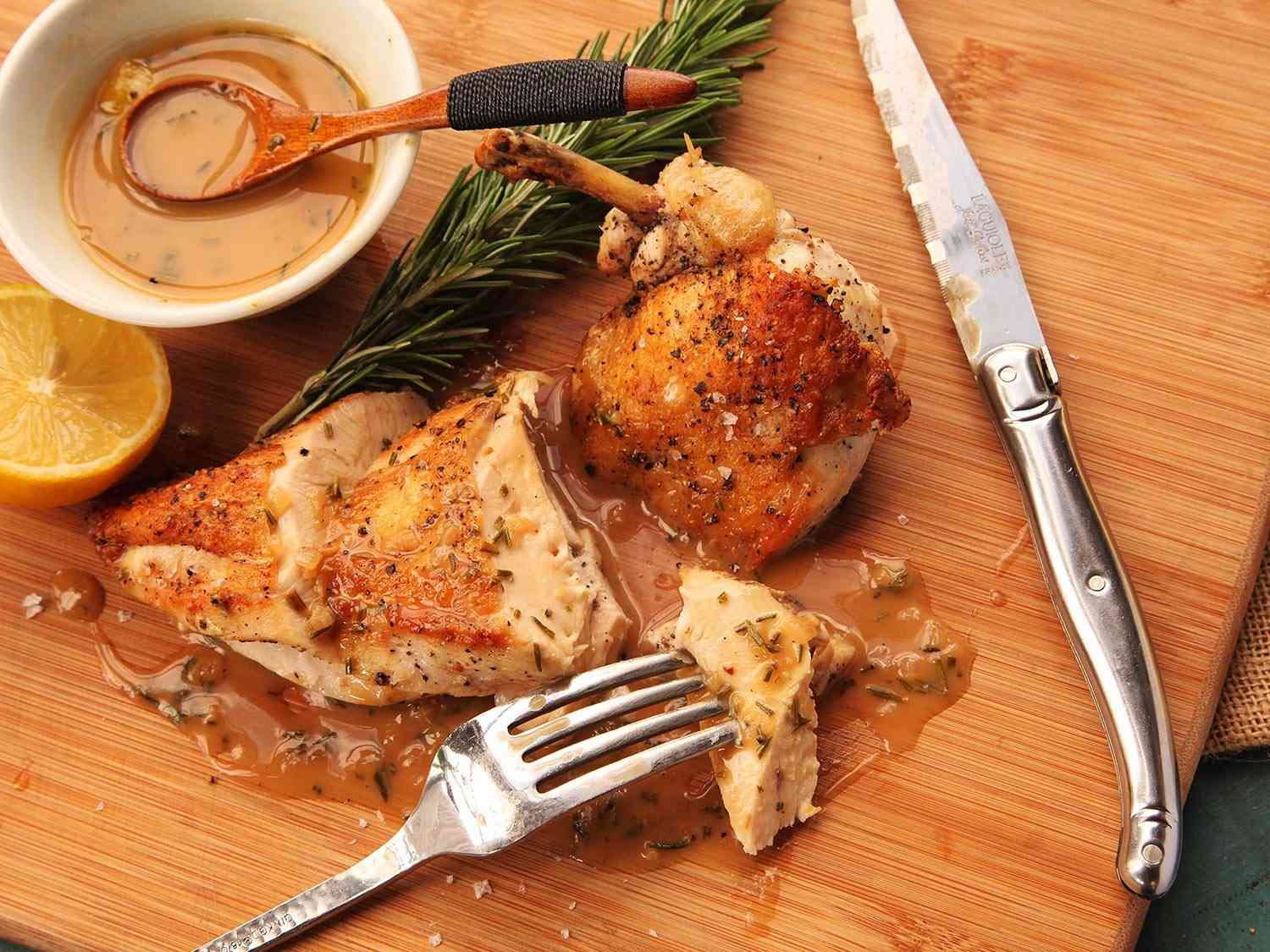 roast chicken on a cutting board