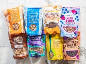 Various Trader Joes granola packages arranged on a marble surface