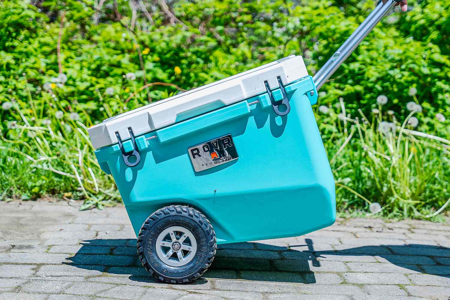 Rovr RollR 60 Wheeled Cooler being pulled outside