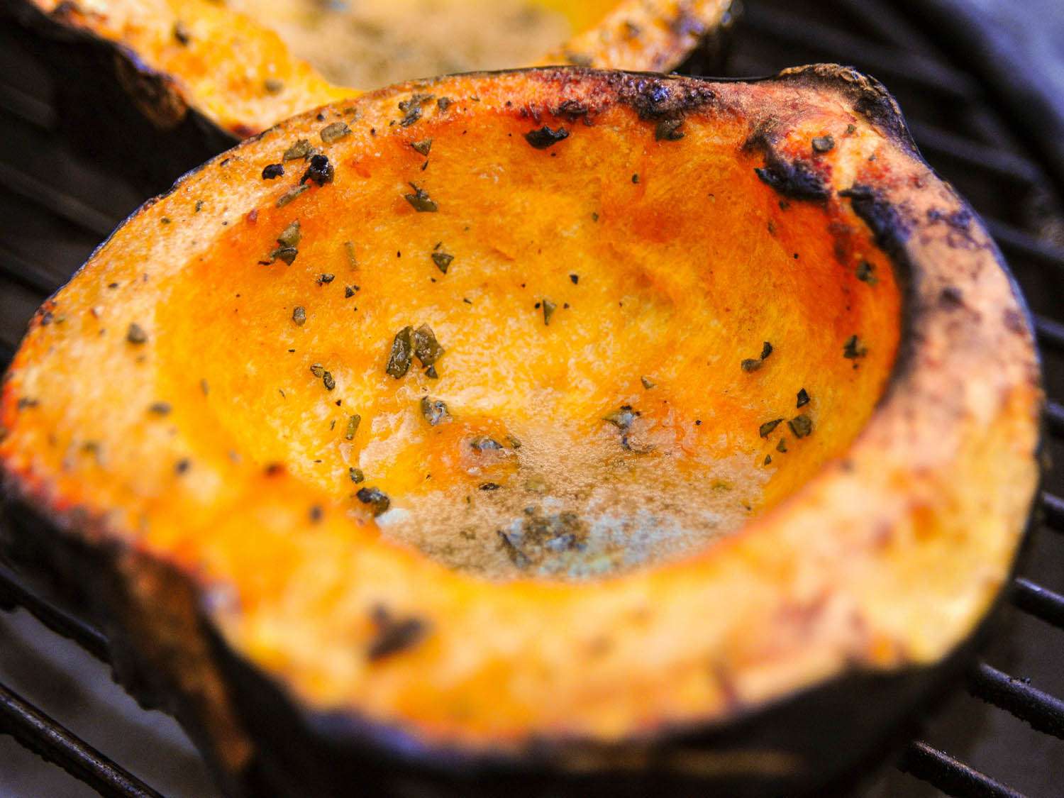 Acorn squash wedges on the grill. 