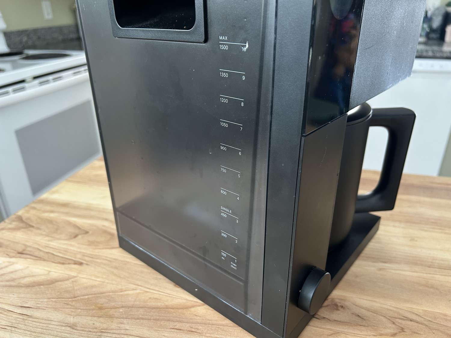 A closeup of the water reservoir of the Fellow Aiden coffee maker.