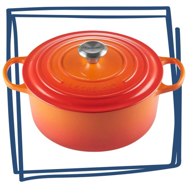 Le Creuset Dutch oven with side handles and a metal knob on the lid