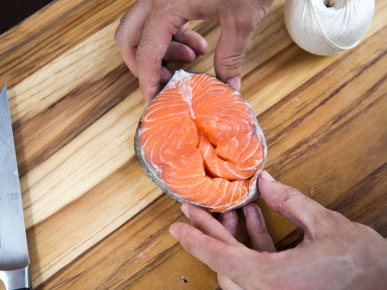 A tightly rolled salmon steak.