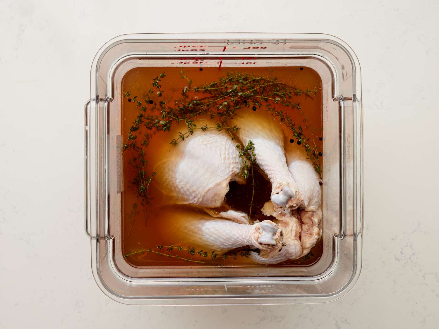 Overhead view of turkey in brine