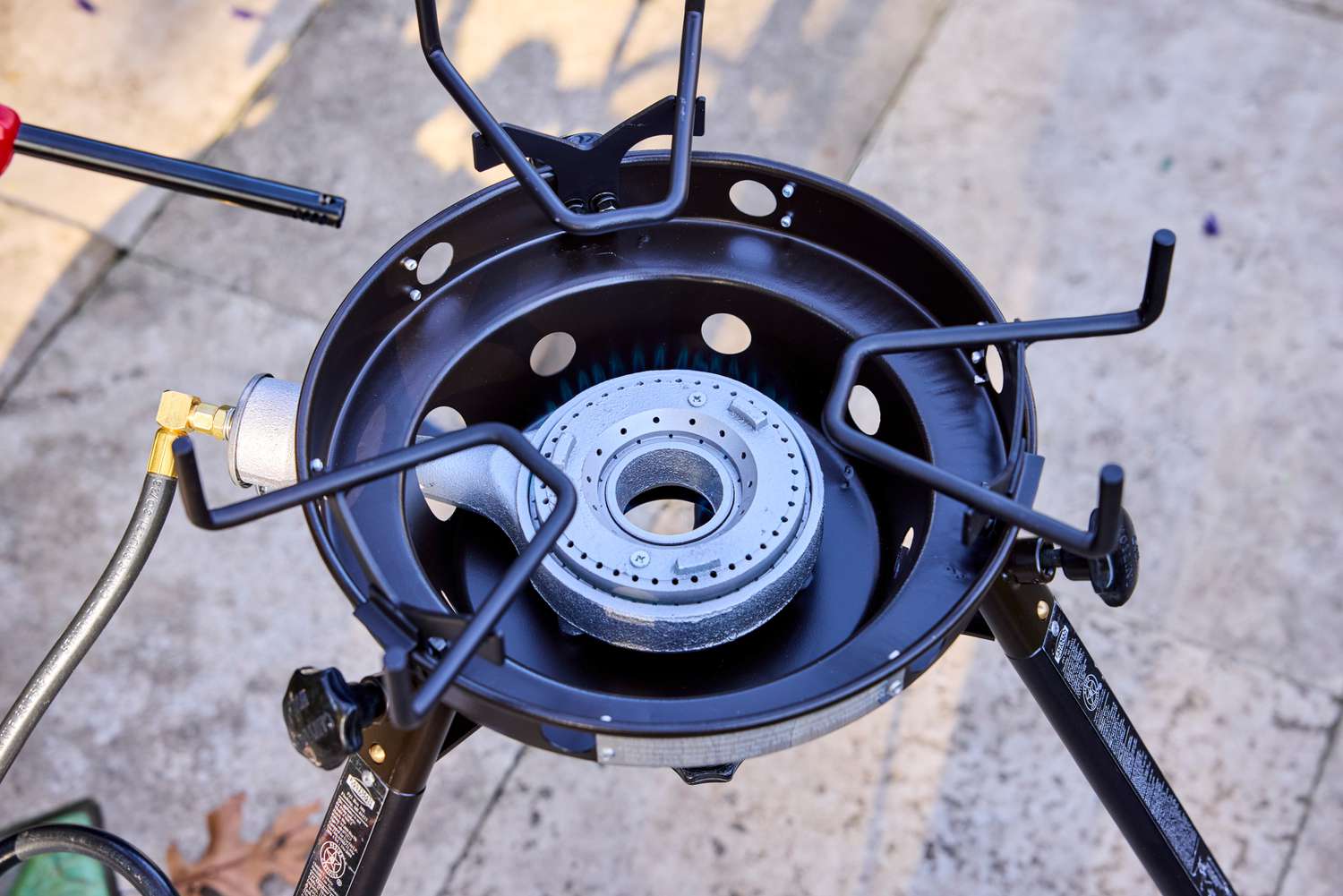 The Eastman outdoor wok burner on a patio.