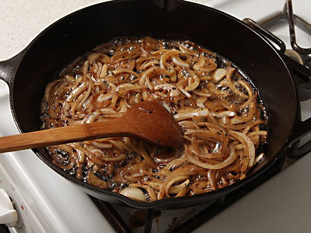 Onions are fried in the pan drippings.