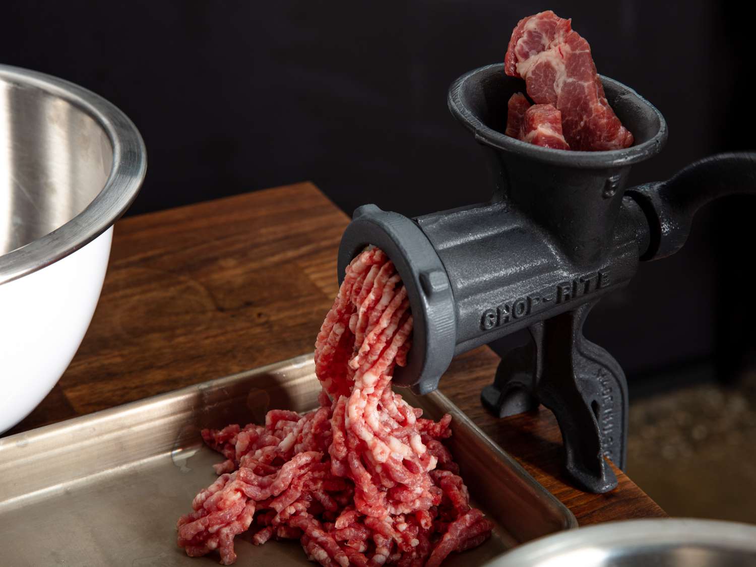 grinding beef chuck in the chop-rite meat grinder