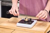 A person sharpens the Misono 8.2 Inch Molybdenum Gyutou 