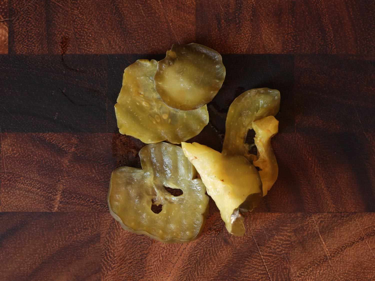 Sad pickle slices from a Whopper.