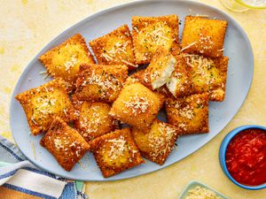 Overhead view of toasted ravioli on a plate