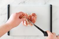 victorinox boning knife with a deboned chicken thigh