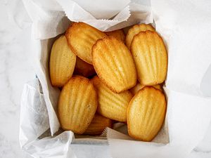 Overhead view of madeleines in box