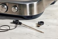 A close up of parts for the Breville PolyScience the Control Freak Smart Induction Cooker